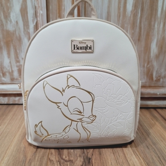Disney Handbags - NWT Disney Bambi Embossed Backpack